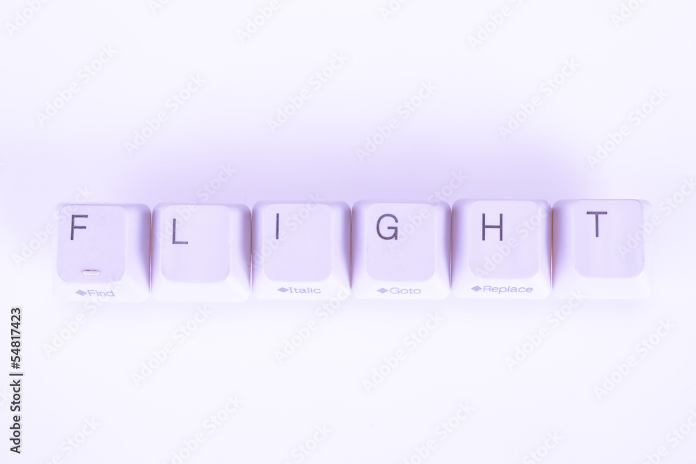 Fototapete flight word written with computer buttons