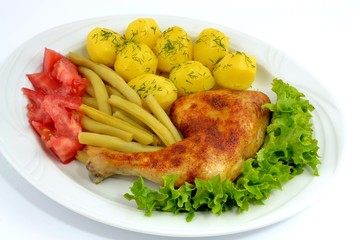 grilled chicken leg with potatoes and green beans