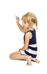 kid holding a chalk about to write