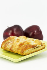 Flakey apple strudel in vertical image