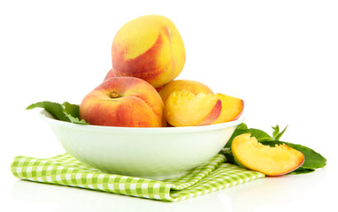 Ripe sweet peaches in bowl, isolated on white
