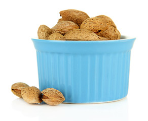 Almond in bowl, isolated on white