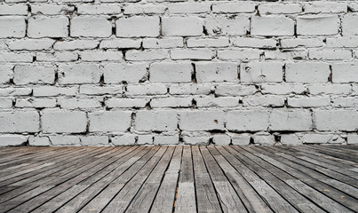 old wood floor and brick wall