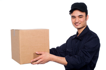 Young boy delivering parcel