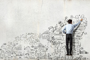 Businessman drawing sketch