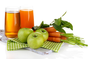 Glasses of juice, apples and carrots, isolated on white