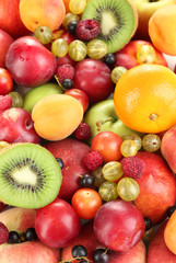 Assortment of juicy fruits   background