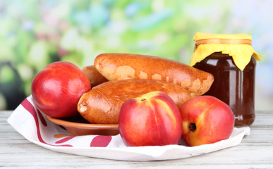 Fresh baked pasties with fruit jam,