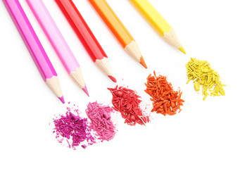 Colour pencils with sharpening shavings isolated on white