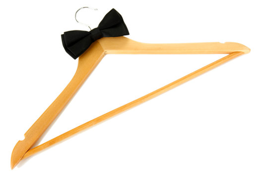 Black bow tie on wooden hanger, isolated on white
