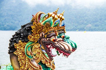 Dragon statue Bedugal temple , lake Braton Bali Indonesia