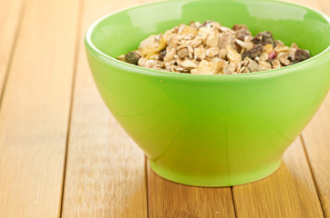 Delicious and healthy cereal in bowl with milk