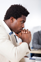 African Businessman Looking At Laptop