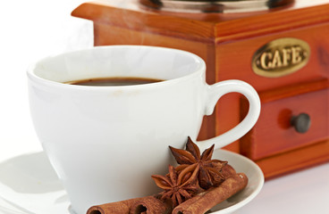coffee beans with wooden coffee grinder and coffee cup.