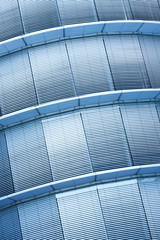 Fototapeta premium Office building with many windows and metal blinds