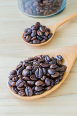 Coffee beans on spoon