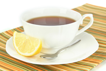 Cup of tea with lemon close-up
