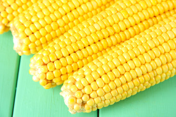 Crude corns on wooden table