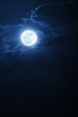 Dramatic Nighttime Clouds and Sky With Beautiful Full Blue Moon - 54843027