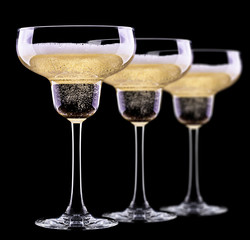glass of champagne isolated on black background