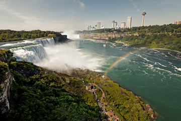 A colorful view of the Niagara Falls and rainbow at sunrise - 54844227