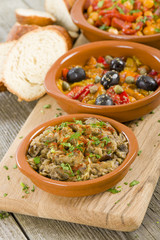 Tapas and Crusty Bread - Selection of Spanish tapas in cazuelas.
