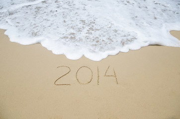 Number 2014 on the beach