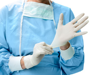 Doctor putting on medical gloves