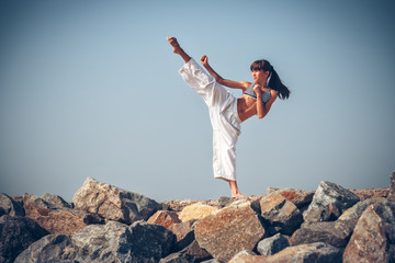 Young girl training karate © Andriy Petrenko