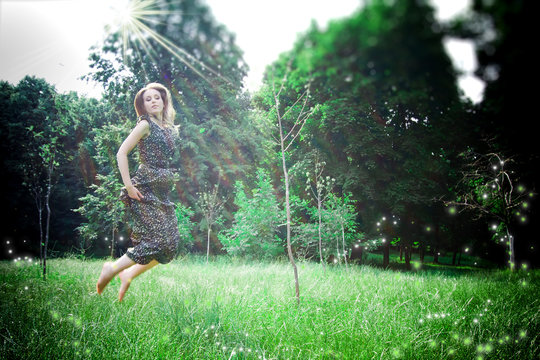 Dreamy photo of yong woman jums