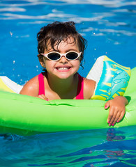 little girl in a pool