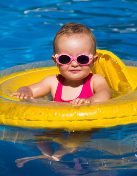 baby swimming in a pool