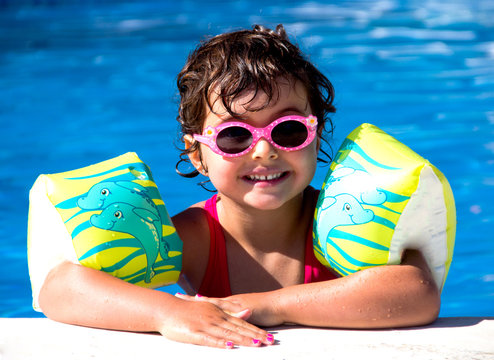 little girl in a pool