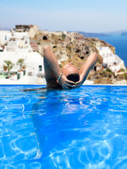 in the swimming pool in Santorini
