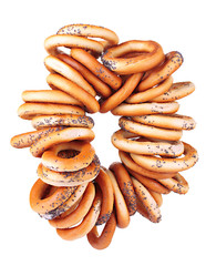 tasty bagels on rope, isolated on white