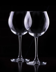 empty wine glass in black background