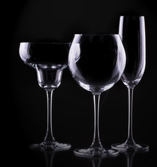 set with different empty glasses