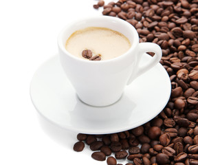 Cup of coffee with coffee beans, isolated on white
