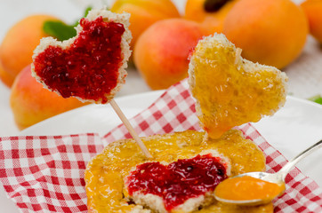 Heart-shaped bread with jam and apricots