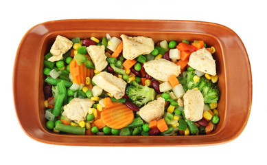 Casserole with vegetables and meat, isolated on white