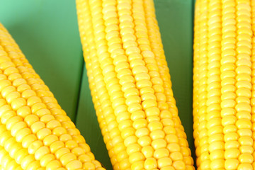 Crude corns on wooden table