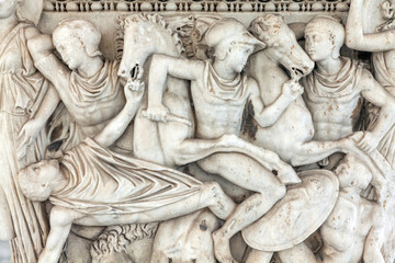 Ancient representations of war carved in Greek marble