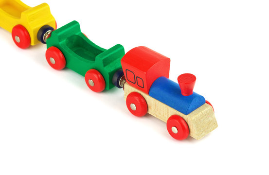 Wooden colorful toy train isolated on white background