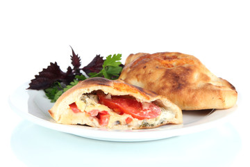 Pizza calzone on table isolated on white