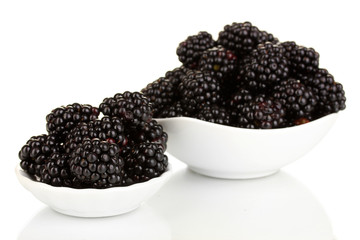 Sweet blackberry in bowl isolated on white