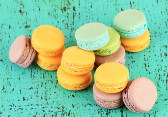 Macaroons on wooden table close-up