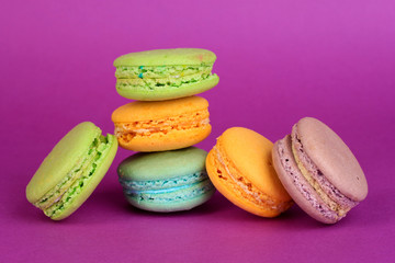 Macaroons on purple background