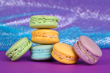 Macaroons on fabric background