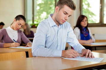 Male student in a classroom