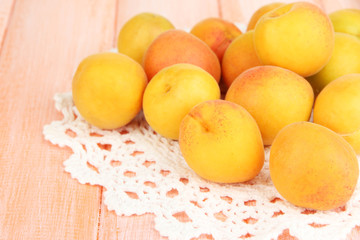 Fresh natural apricot on wooden table